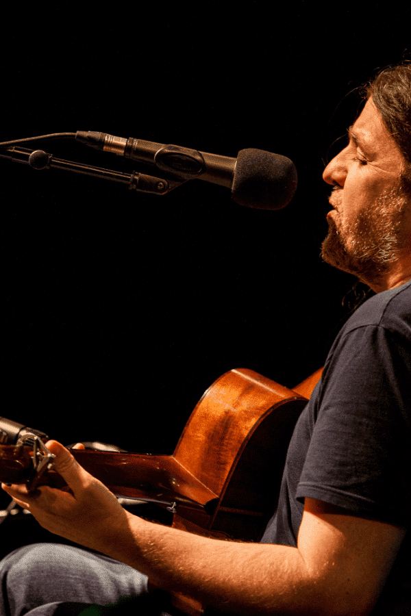 Seamie O'Dowd playing guitar